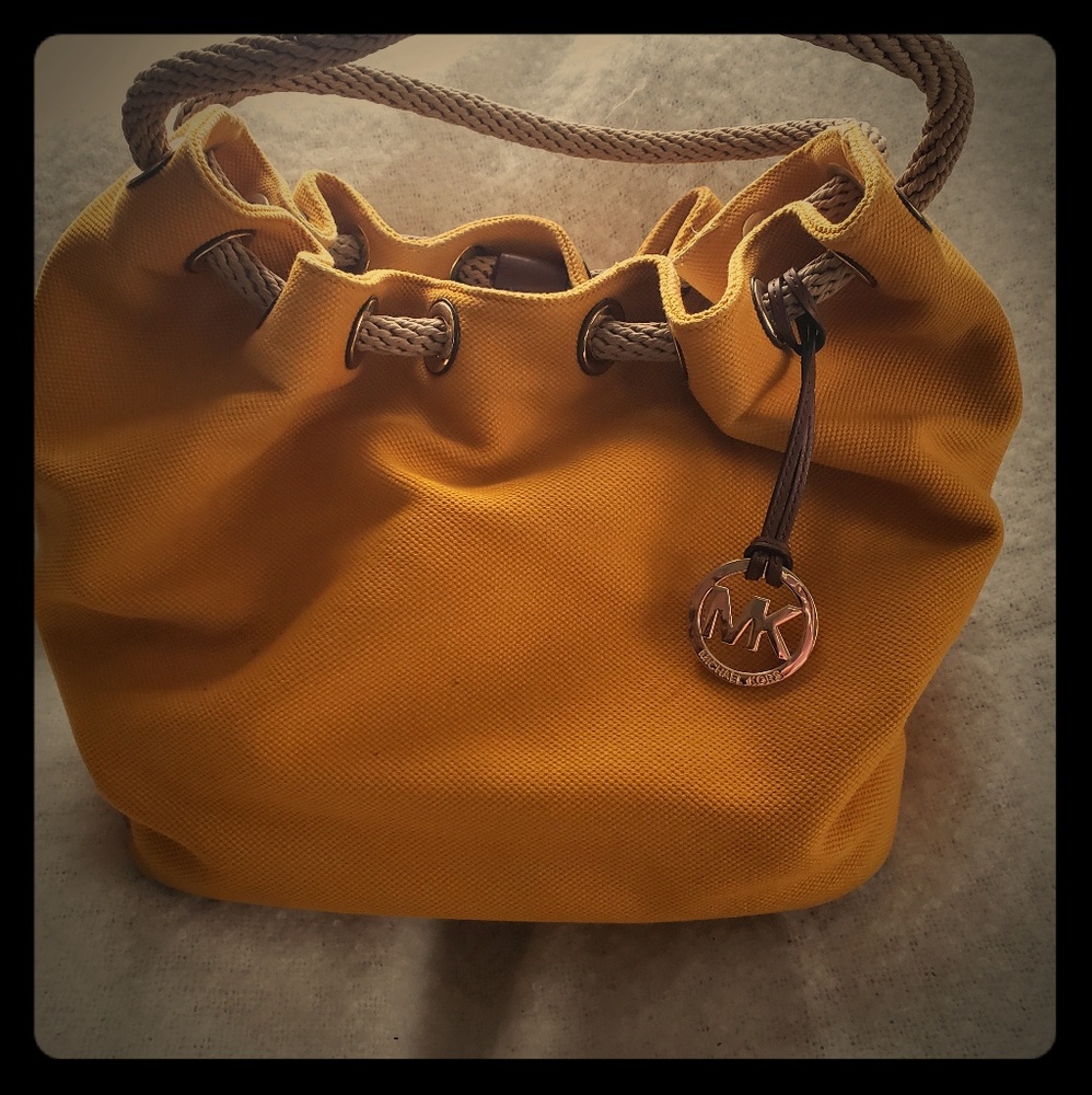 large mustard mk hobo bag